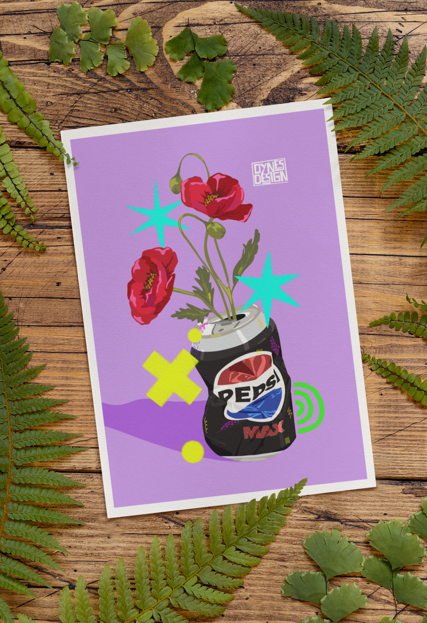 An art print with a white border, featuring a purple background and an illustration of red poppies growing from a black Pepsi Max can, styled flat-lay on a rustic wooden surface surrounded by green ferns. The artist's brand 'Dynes Design' is visible in the top right corner of the print.
