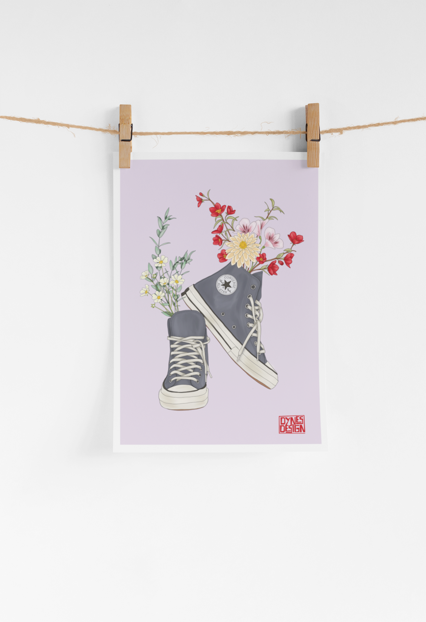 Poster of a sneaker with flowers on a purple background, hanging on a clothesline.